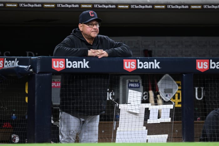 Jun 13, 2023; San Diego, California, USA; Cleveland Guardians manager Terry Francona (77) looks on from the dugout during the seventh inning against the San Diego Padres at Petco Park. Mandatory Credit: Orlando Ramirez-USA TODAY Sports